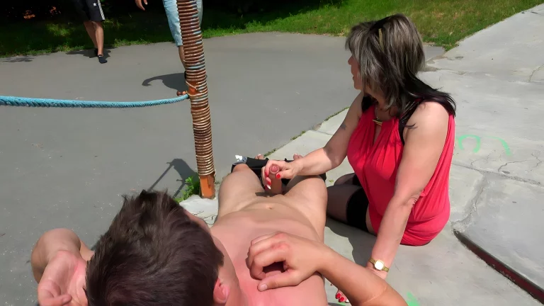 Brunette MILF Strokes A Hard Cock Outdoors